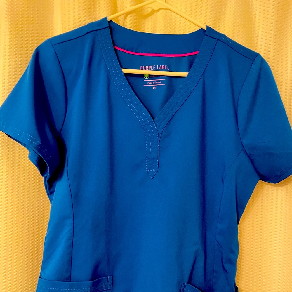 Royal blue healing hands scrub top. Size medium
